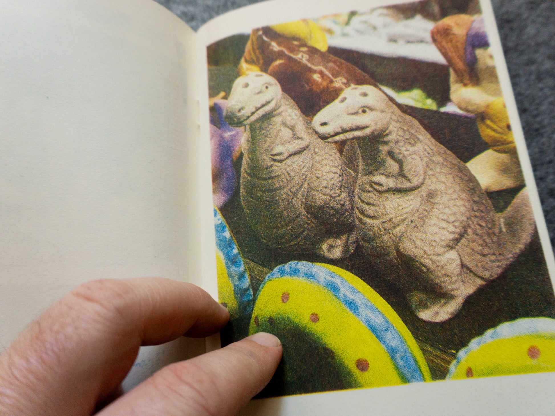 Detail image of a pair of dinosaur salt and pepper shakers.