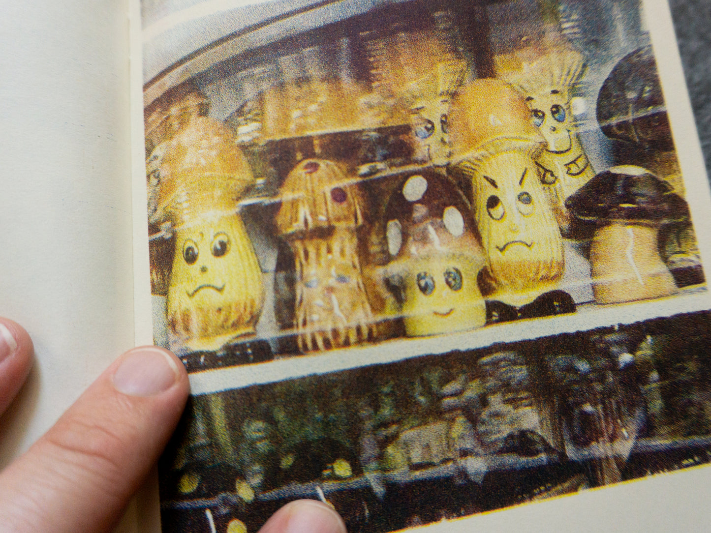 Various mushroom salt and pepper shakers with a mix of different expressions on their faces.